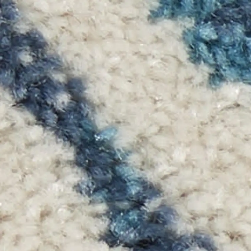 Ivory And Blue Geometric Area Rug Photo 1