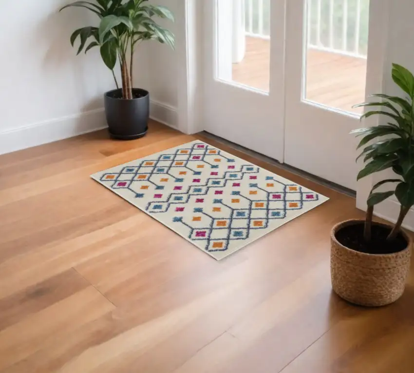 Ivory And Blue Geometric Area Rug Photo 2