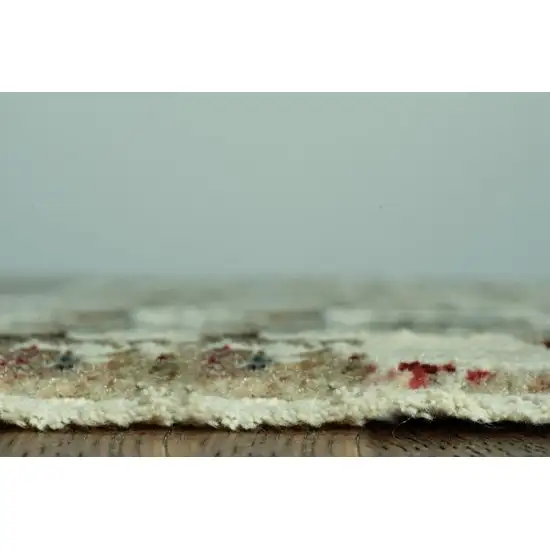 8' Ivory Red And Blue Abstract Round Rug Photo 7