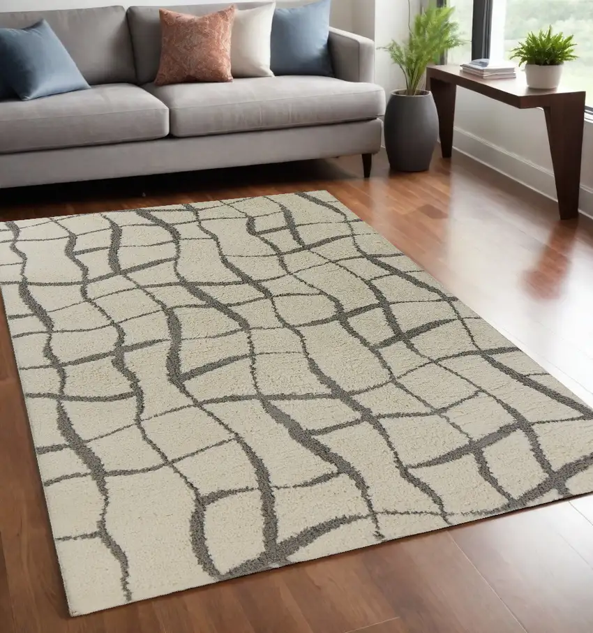 Ivory Machine Woven Abstract Indoor Shag Rug Photo 1