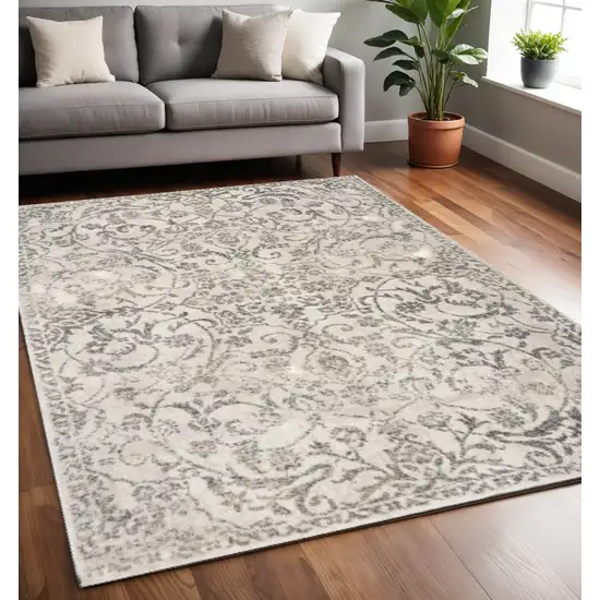 Ivory And Brown Floral Medallion Distressed Area Rug Photo 1