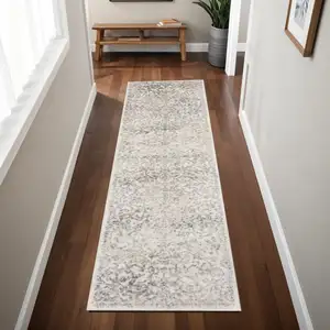 Photo of Ivory Machine Woven Distressed Floral Vines Indoor Runner Rug