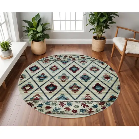 8' Ivory Blue And Red Geometric Round Rug Photo 1