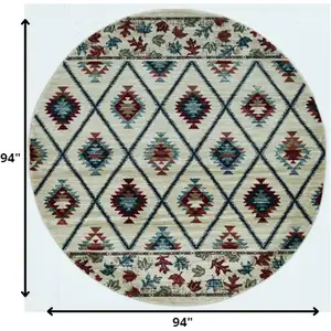 Photo of Ivory Machine Woven Geometric Lodge Round Indoor Area Rug