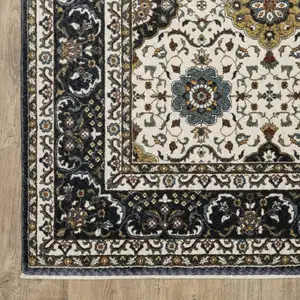 Photo of Ivory Medallion Area Rug With Fringe