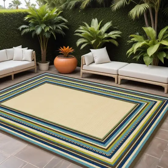 Ivory and Blue Striped Indoor Outdoor Area Rug Photo 1
