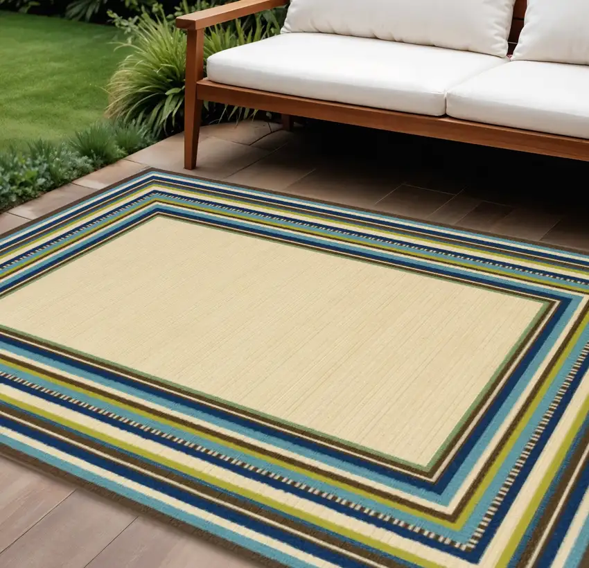 Ivory And Blue Striped Indoor Outdoor Area Rug Photo 1