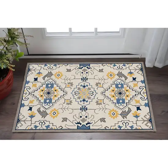 Ivory Blue And Yellow Southwestern Hand Tufted Area Rug Photo 1