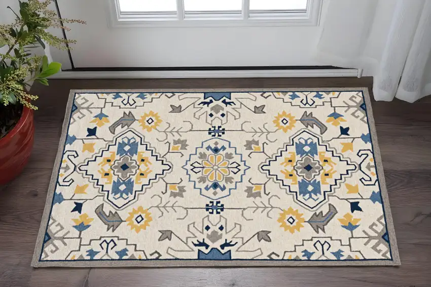 Ivory Blue And Yellow Southwestern Hand Tufted Area Rug Photo 1