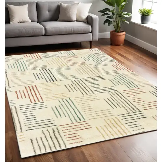 Ivory Blue And Red Geometric Area Rug Photo 1