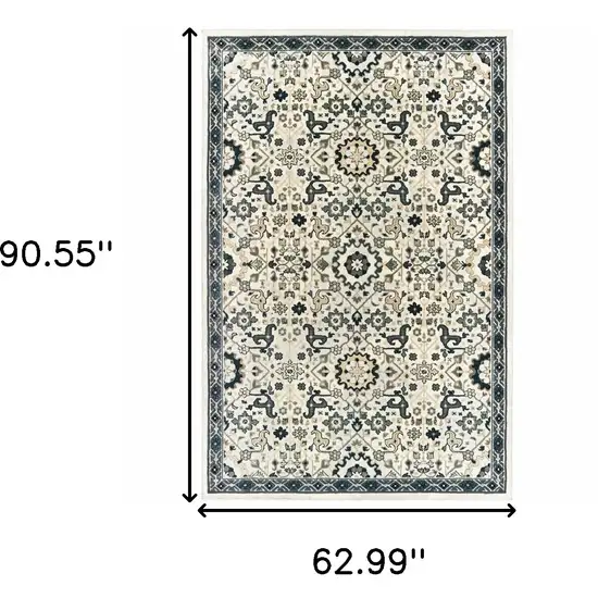 Ivory Navy And Gold Oriental Power Loom Stain Resistant Area Rug Photo 3