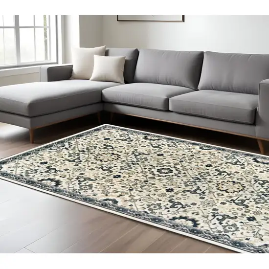 Ivory And Navy Blue Oriental Area Rug Photo 1