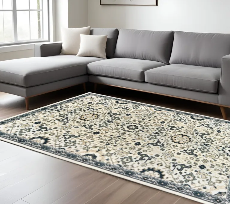 Ivory Navy And Gold Oriental Power Loom Stain Resistant Area Rug Photo 1