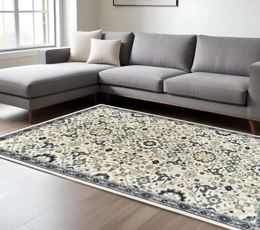 Ivory Navy And Gold Oriental Power Loom Stain Resistant Area Rug Photo 1
