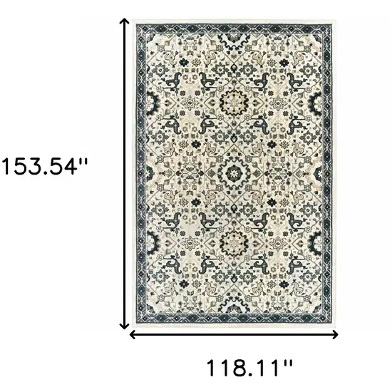 Ivory Navy And Gold Oriental Power Loom Stain Resistant Area Rug Photo 3