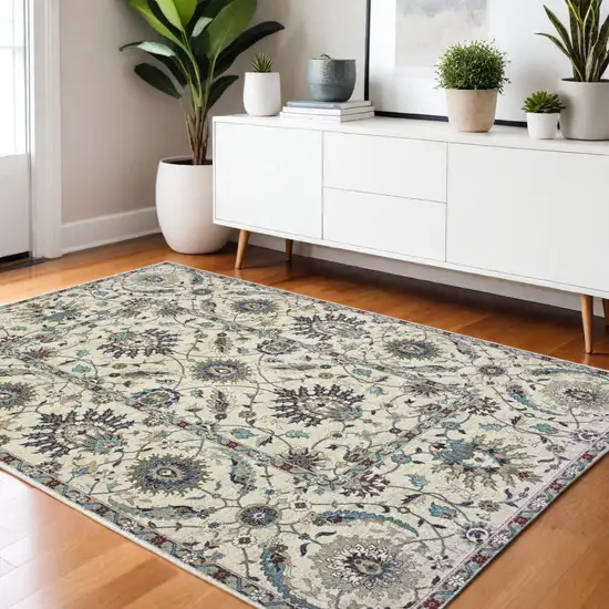 Ivory Navy Blue And Brown Oriental Area Rug Photo 1
