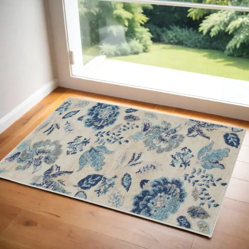 Ivory Navy Blue And Light Blue Floral Area Rug Photo 1