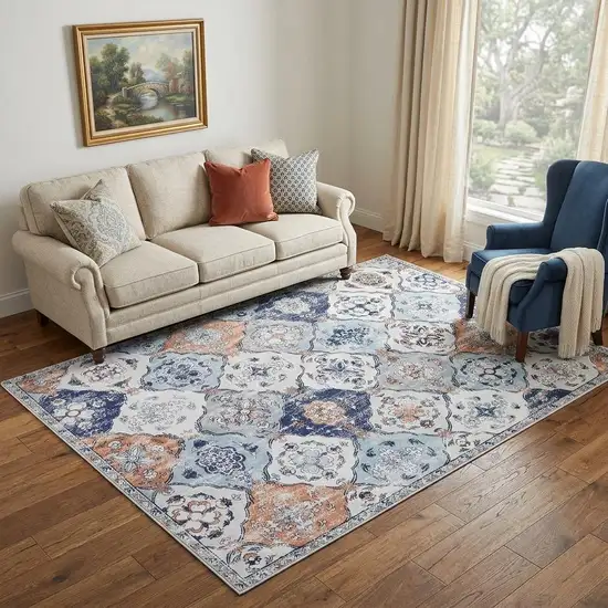 Ivory Navy Blue And Terra Cotta Quatrefoil Distressed Area Rug Photo 1