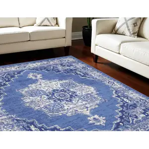 Photo of Ivory Navy Blue and Beige Floral Medallion Distressed Non Skid Area Rug