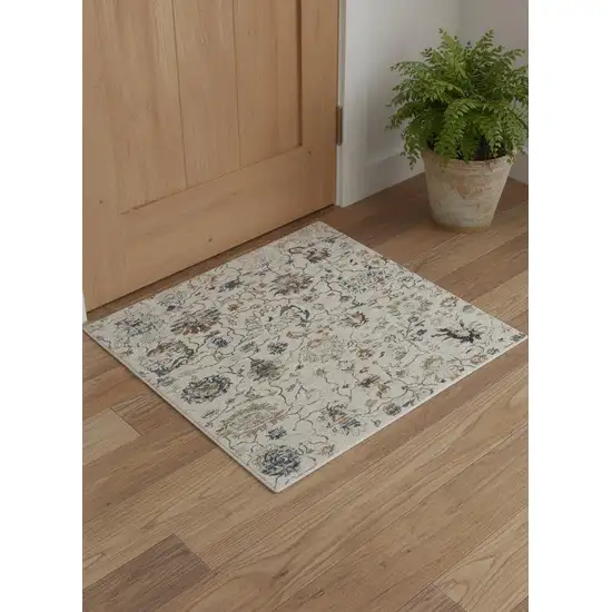 Ivory Blue And Burnt Orange Floral Distressed Area Rug With Fringe Photo 1
