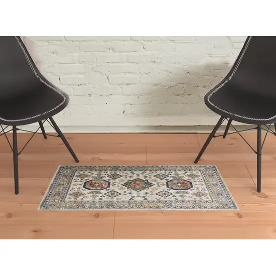 Ivory Orange And Blue Floral Stain Resistant Area Rug Photo 4
