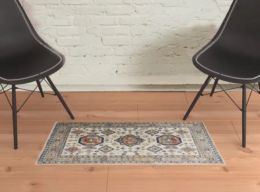 Ivory Orange And Blue Floral Stain Resistant Area Rug Photo 4