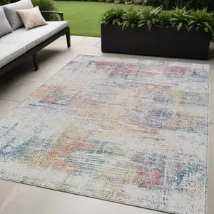 Photo of Ivory Orange And Blush Abstract Washable Indoor Outdoor Area Rug