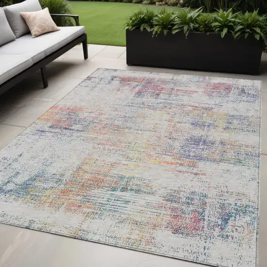 Ivory Orange And Blush Abstract Washable Indoor Outdoor Area Rug Photo 1