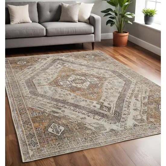 Brown Ivory And Orange Medallion Distressed Washable Area Rug Photo 1