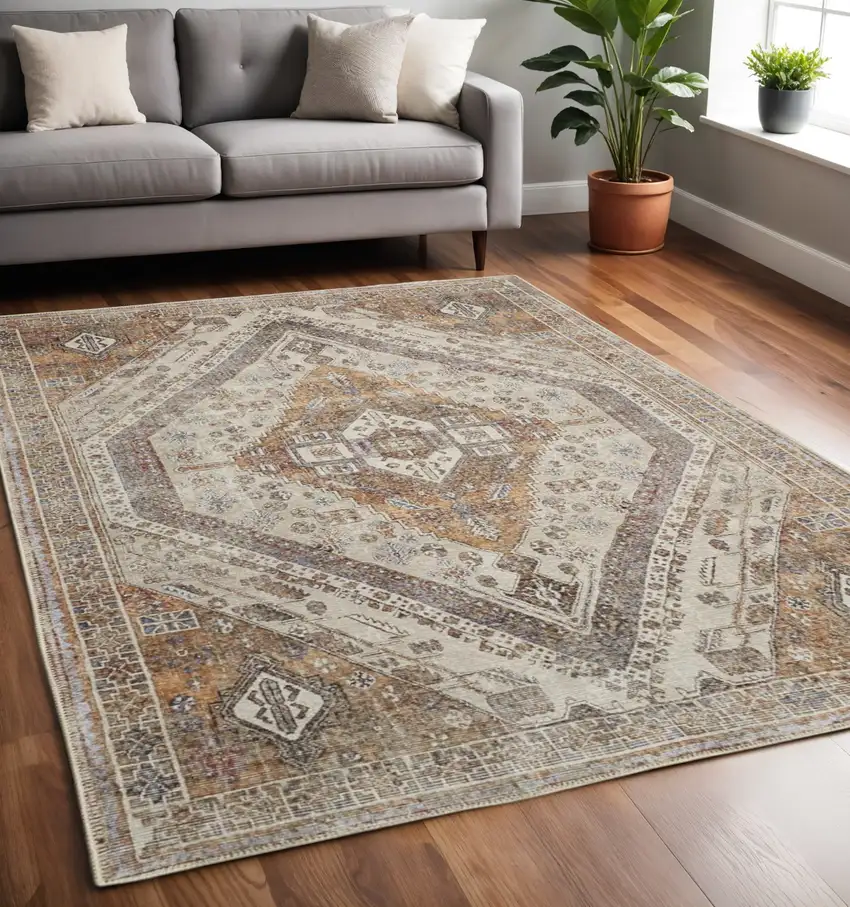 Brown Ivory And Orange Medallion Distressed Washable Area Rug Photo 1