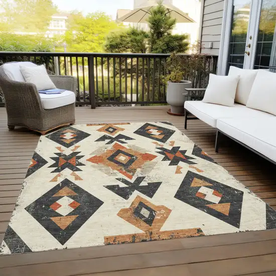 Ivory Orange And Charcoal Aztec Washable Indoor Outdoor Area Rug Photo 9