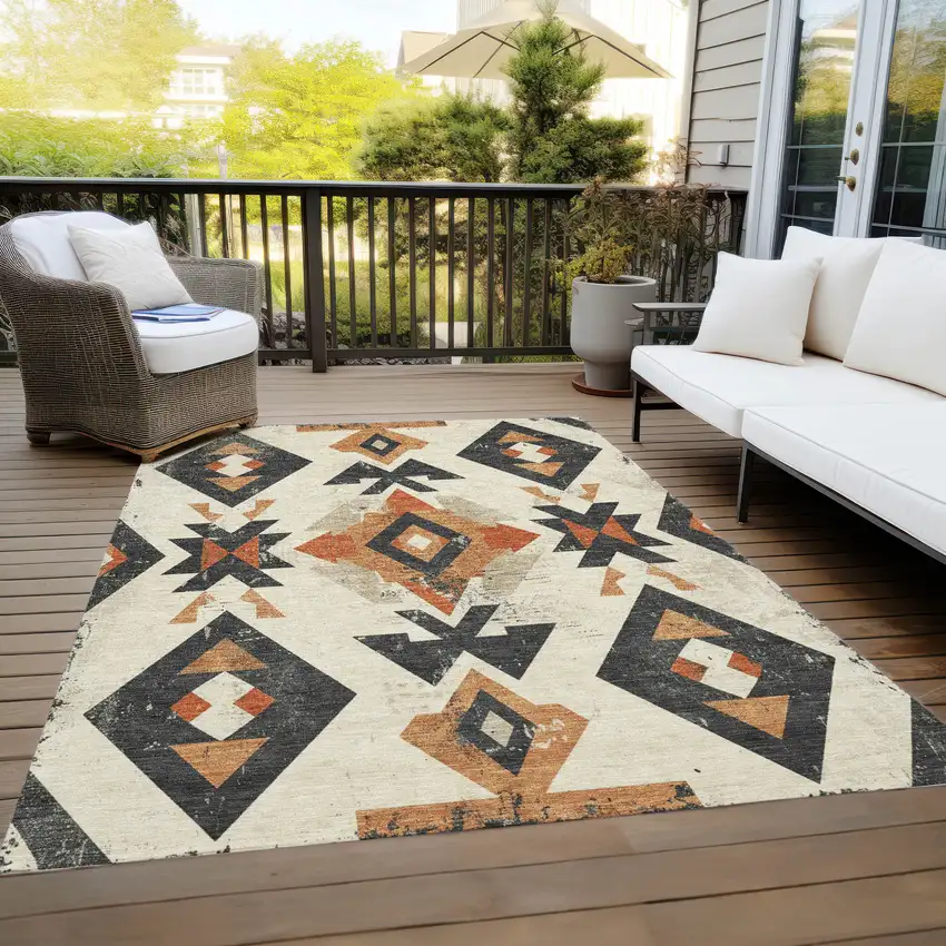 Ivory Orange And Charcoal Aztec Washable Indoor Outdoor Area Rug Photo 9