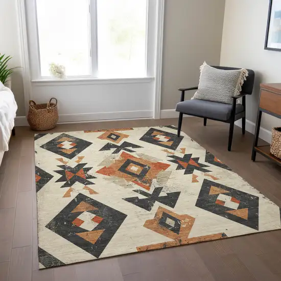 Ivory Orange And Charcoal Aztec Washable Indoor Outdoor Area Rug Photo 8