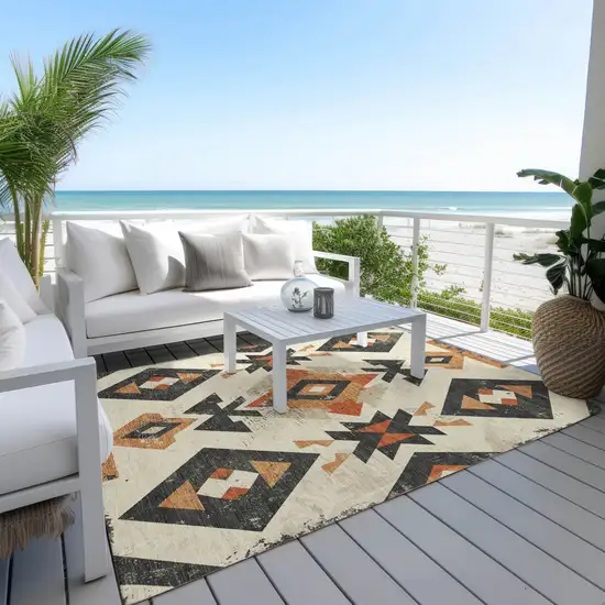 Ivory Orange And Charcoal Aztec Washable Indoor Outdoor Area Rug Photo 6