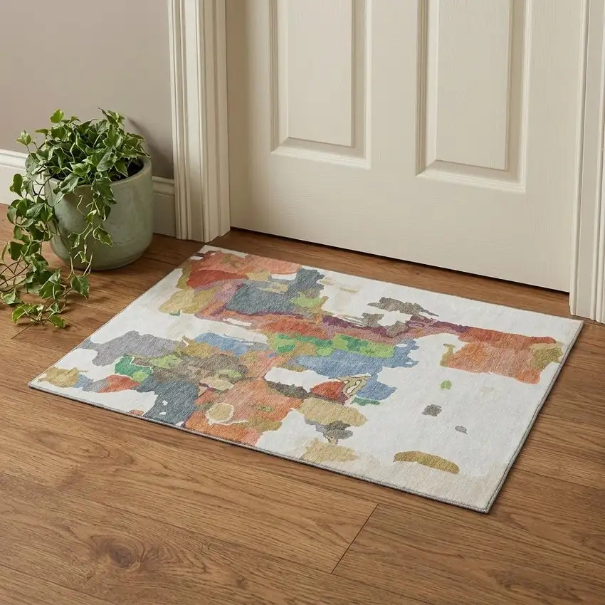 Ivory Orange Blue And Green Abstract Washable Area Rug With UV Protection Photo 1