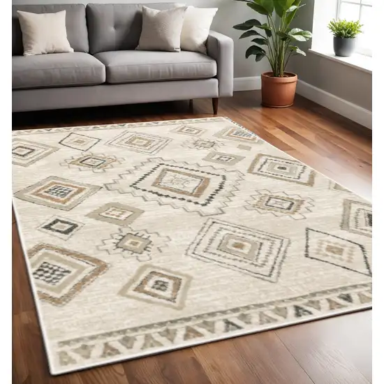 Ivory Orange Tan Black And Grey Southwestern Power Loom Stain Resistant Area Rug Photo 1