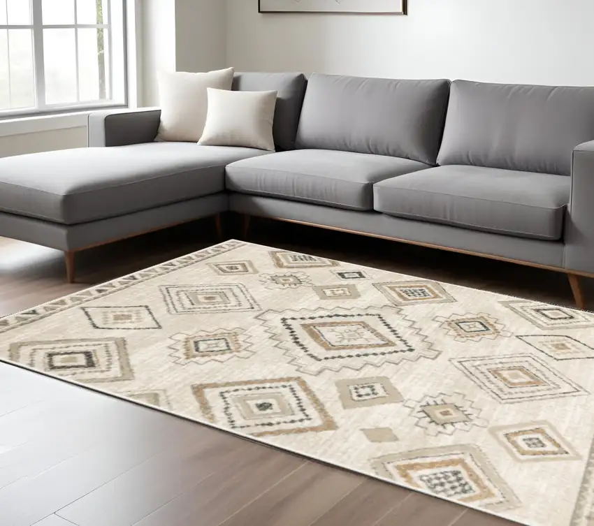 Ivory Orange Tan Black And Grey Southwestern Power Loom Stain Resistant Area Rug Photo 1