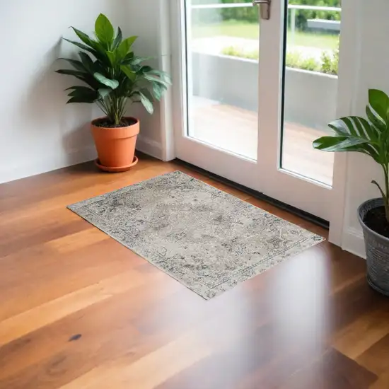 Ivory Oriental Distressed Area Rug Photo 1