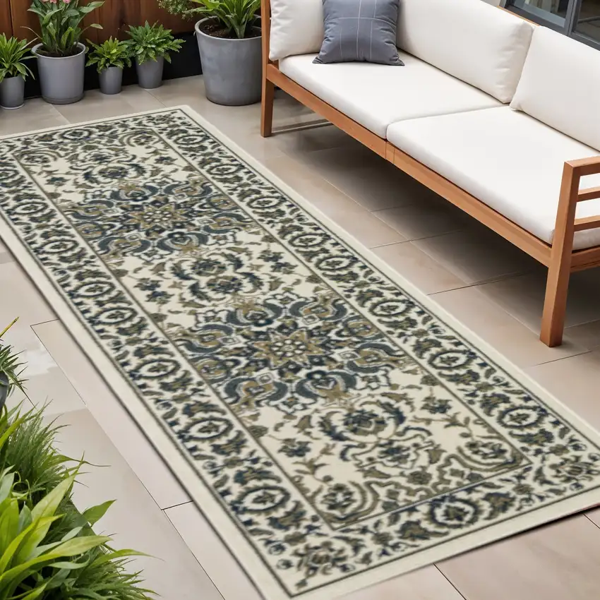 Ivory and Blue Oriental Stain Resistant Indoor Outdoor Area Rug Photo 1