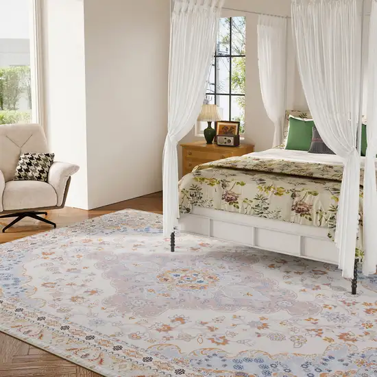 Ivory Peach And Slate Blue Medallion Distressed Area Rug Photo 4