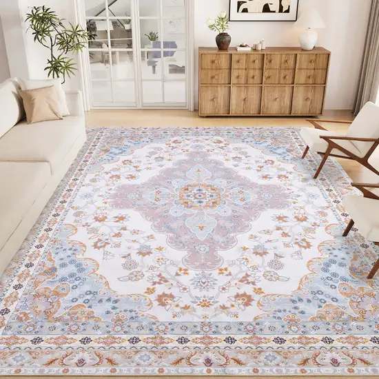 Ivory Peach And Slate Blue Medallion Distressed Area Rug Photo 7