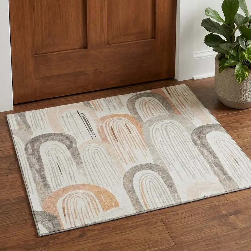 Ivory Peach And Taupe Geometric Washable Area Rug With UV Protection Photo 1