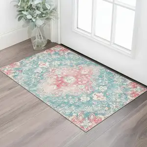 Photo of Ivory Pink And Aqua Medallion Distressed Washable Area Rug