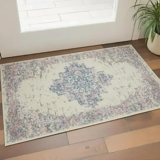 Ivory Pink And Blue Medallion Distressed Area Rug Photo 1