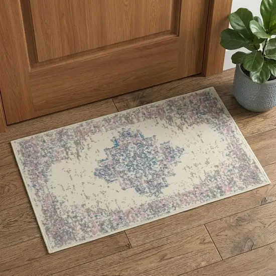 Ivory Pink And Blue Medallion Distressed Area Rug Photo 1