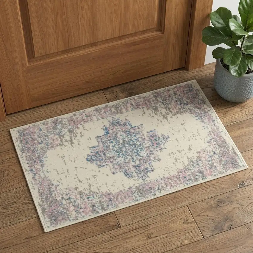 Ivory Pink And Blue Medallion Distressed Area Rug Photo 1