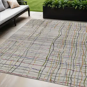 Photo of Ivory Pink And Copper Striped Washable Indoor Outdoor Area Rug
