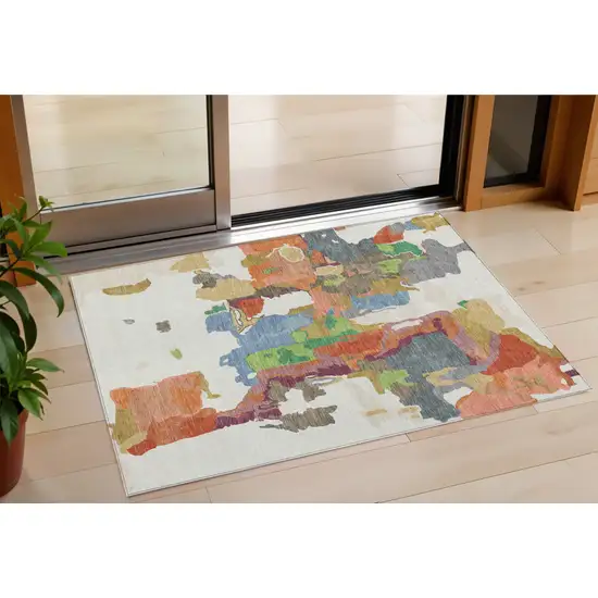Ivory Pink And Green Abstract Washable Indoor Outdoor Area Rug Photo 1