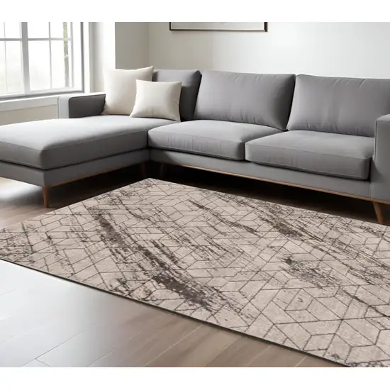 Ivory And Brown Geometric Area Rug Photo 1