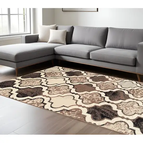 Ivory Brown And Black Quatrefoil Distressed Area Rug Photo 1